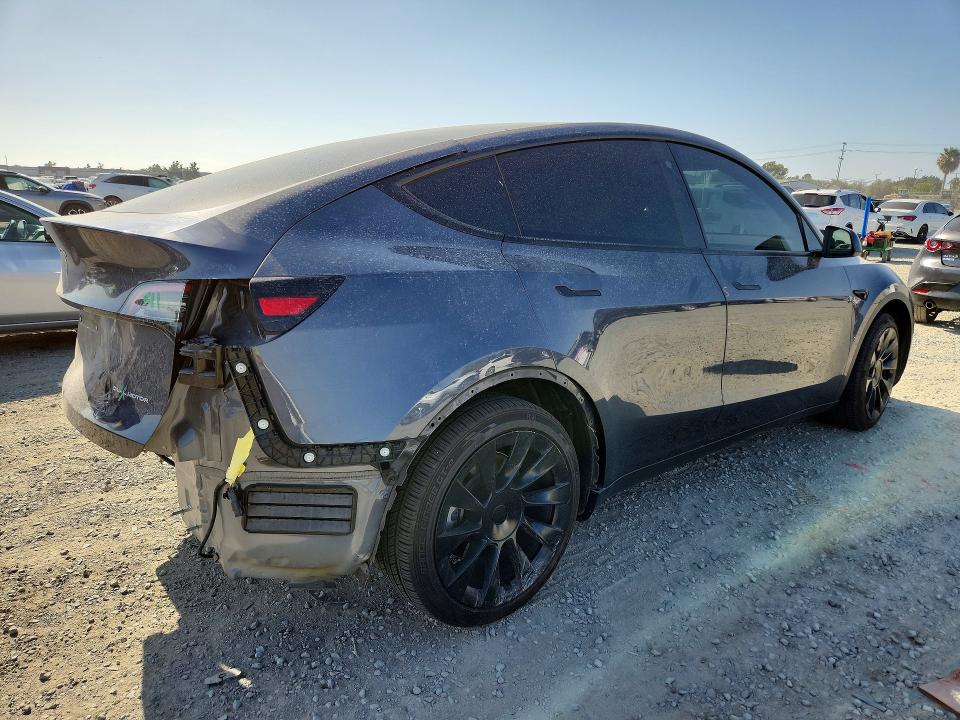 2023 Tesla Model y VIN 7SAYGDEE5PA027538 COPART salvage auction — REAR END, Ca - Salvage Certificate, sold $8,200 on 2026-07-02 (photo 3)
