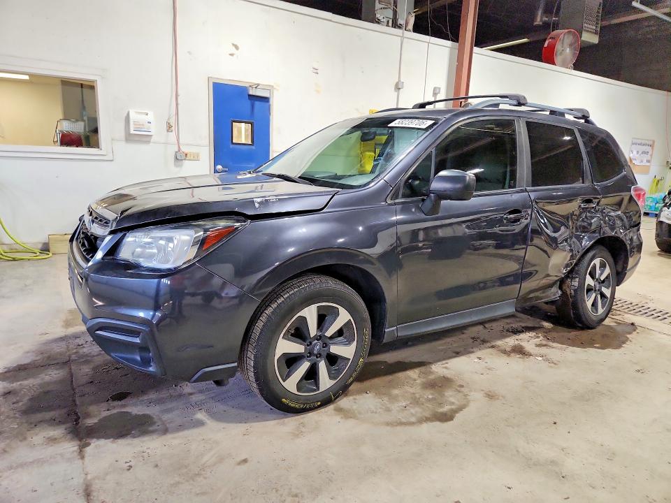2017 Subaru Forester VIN JF2SJABC5HH594571 COPART salvage auction — REAR END, Mn - Cert Of Title-Prior Salvage, sold $1,900 on 2026-07-23 (photo 1)