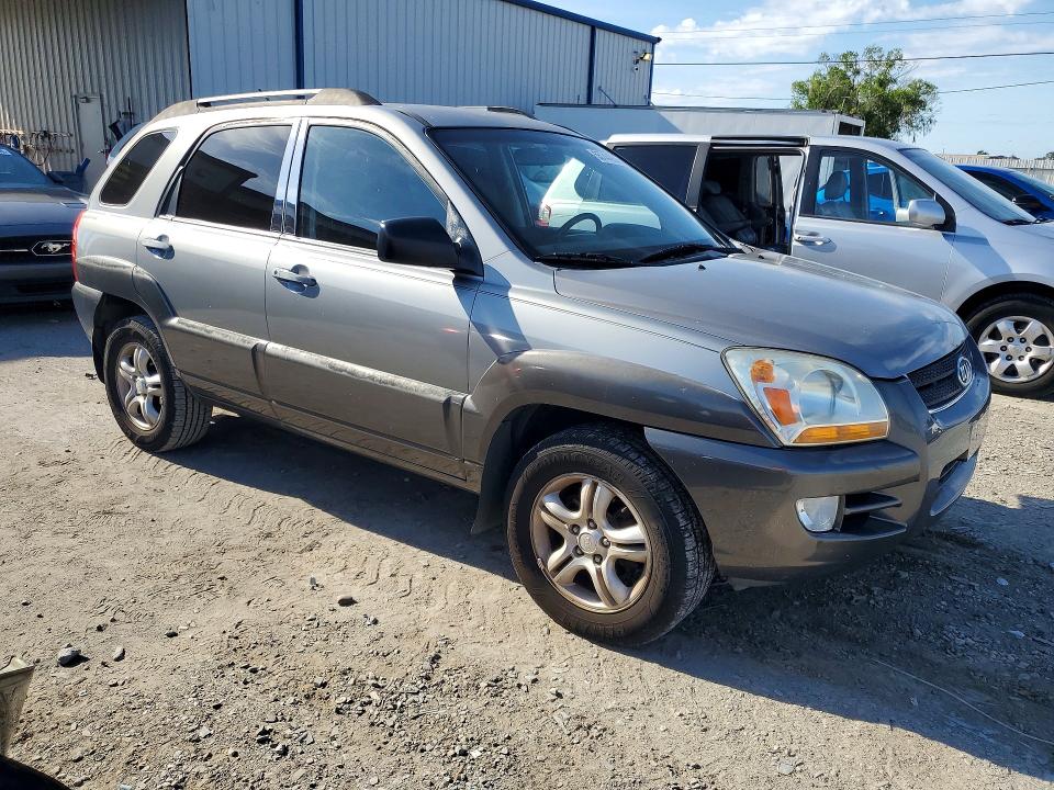 2006 Kia Sportage VIN KNDJF723867289924 COPART salvage auction — REAR END, FL - CERT OF TITLE SLVG REBUILDABLE, sold $900 on 2026-07-17 (photo 4)
