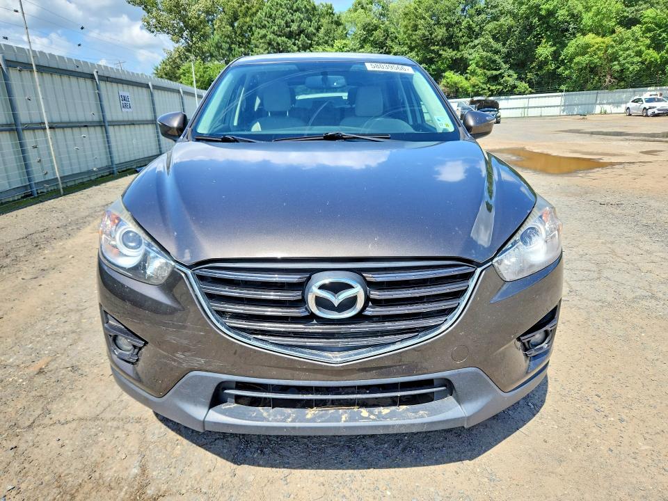 2016 Mazda Cx-5 VIN JM3KE2CYXG0886479 COPART salvage auction — WATER/FLOOD, La - Cert Of Title-Salvage Flood, sold $2,100 on 2026-07-09 (photo 5)