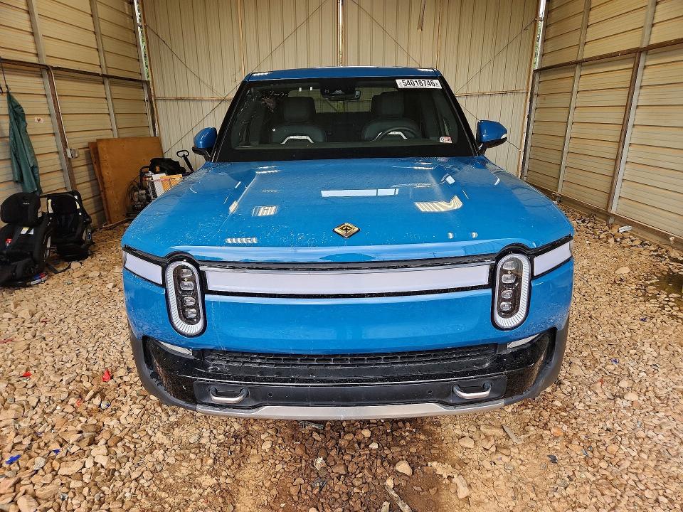 2023 Rivian VIN 7FCTGAAAXPN026117 COPART salvage auction — SIDE, Nc - Salvage Certificate Of Title, sold $8,000 on 2026-07-27 (photo 5)
