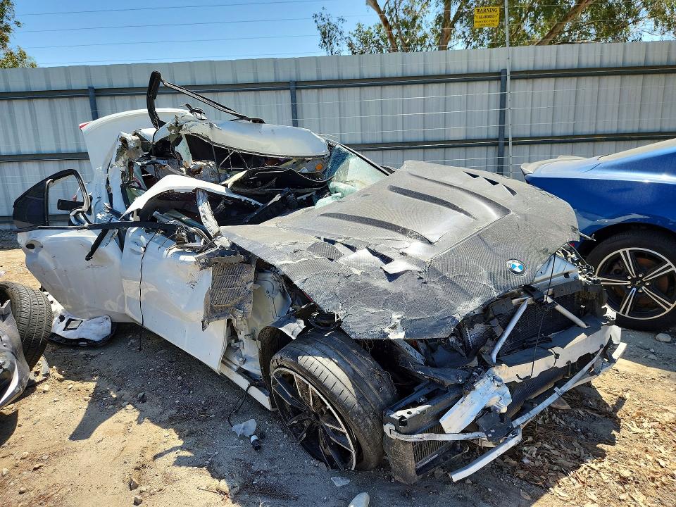 2020 BMW M340i VIN WBA5U7C03LFH04693 COPART salvage auction — ALL OVER, Ca - Salvage Certificate, sold $1,600 on 2026-07-28 (photo 4)