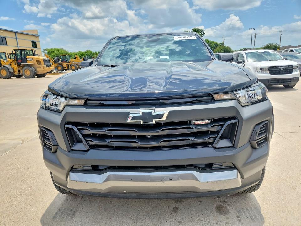 2025 Chevrolet Colorado VIN 1GCPTEEK7S1243881 COPART salvage auction — SIDE, Tx - Salvage Vehicle Title, sold $16,800 on 2026-07-09 (photo 5)