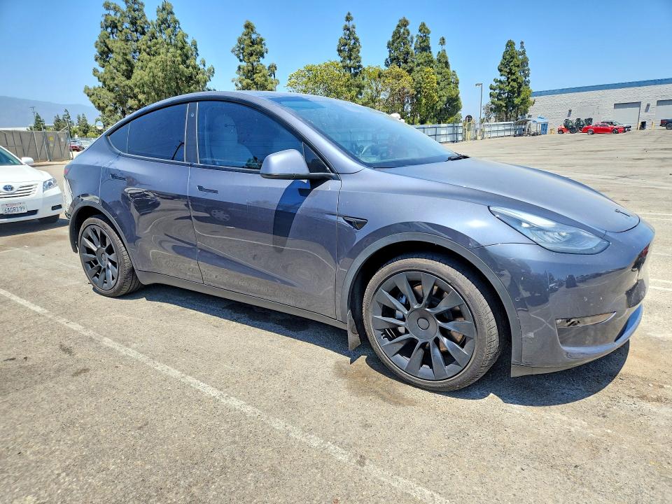 2021 Tesla Model y VIN 5YJYGDEEXMF157438 COPART salvage auction — REAR END, CA - SALVAGE CERTIFICATE, sold $500 on 2026-07-28 (photo 4)