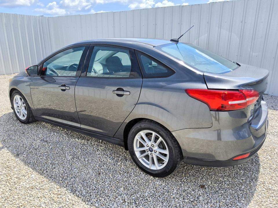 2016 Ford Focus VIN 1FADP3F23GL390825 COPART salvage auction — REAR END, Fl - Certificate Of Title, sold $125 on 2026-07-07 (photo 2)
