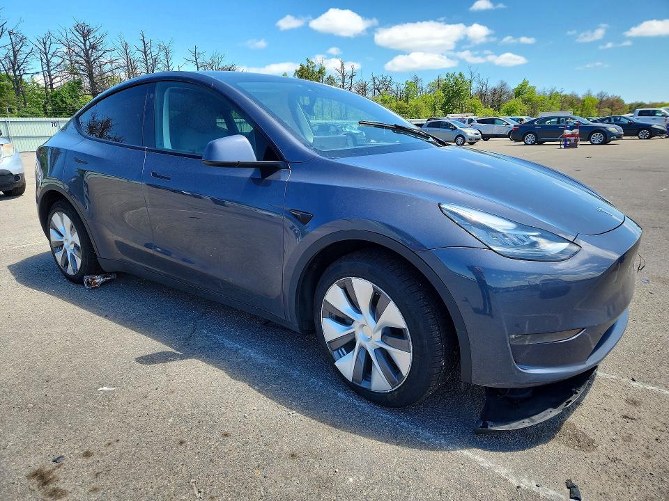 2023 Tesla Model y VIN 7SAYGDEE3PA040255 COPART salvage auction — FRONT END, Ny - Mv-907A Salvage Certificate, sold $11,900 on 2026-07-06 (photo 4)