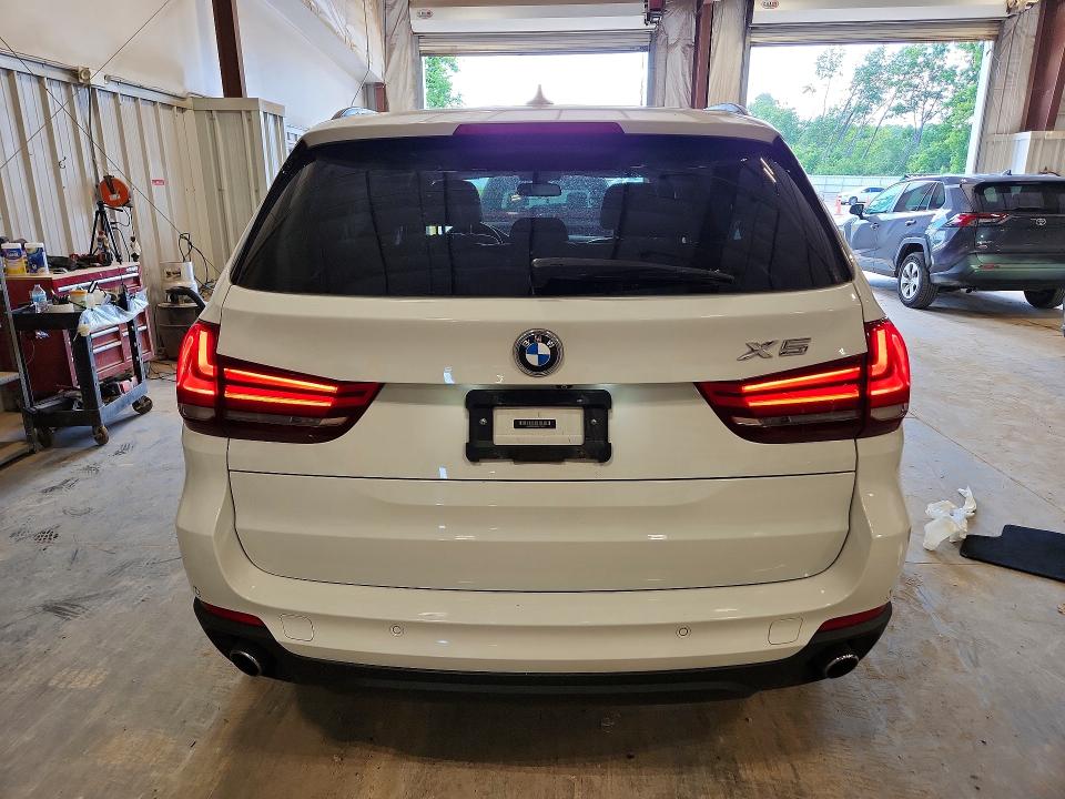 2014 BMW VIN 5UXKR0C58E0H17597 COPART salvage auction — MINOR DENT/SCRATCHES, Wi - Certificate Of Title, sold $6,600 on 2026-07-15 (photo 6)