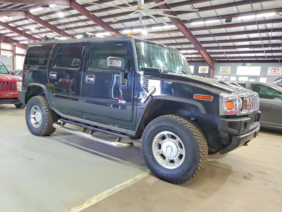 2006 Hummer H2 VIN 5GRGN23U06H119962 COPART salvage auction — MINOR DENT/SCRATCHES, NY - CERTIFICATE OF TITLE, sold $5,000 on 2026-07-31 (photo 4)