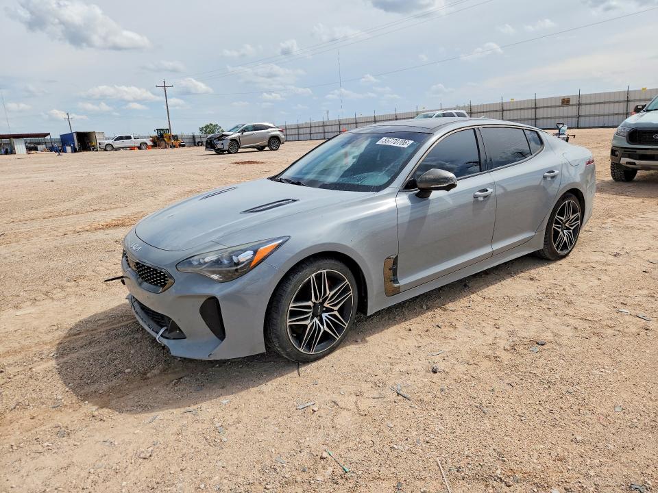 2022 Kia Stinger VIN KNAE55LCXN6099857 COPART salvage auction — WATER/FLOOD, TX - SALVAGE VEHICLE TITLE, sold $2,100 on 2026-07-29 (photo 1)