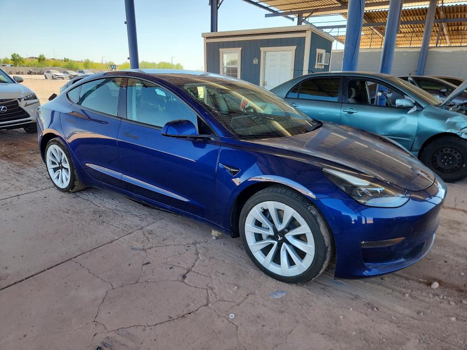 2022 Tesla Model 3 VIN 5YJ3E1EB7NF133006 COPART salvage auction — MINOR DENT/SCRATCHES, Az - Cert Of Title - Salvage, sold $9,000 on 2026-07-14 (photo 4)