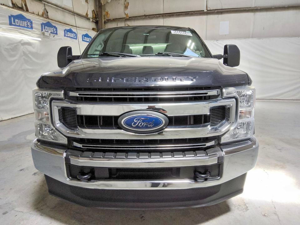 2021 Ford F-250 super duty VIN 1FT7W2BN8MEC84309 COPART salvage auction — NORMAL WEAR, IN - CERTIFICATE OF TITLE, sold $13,300 on 2026-07-16 (photo 5)