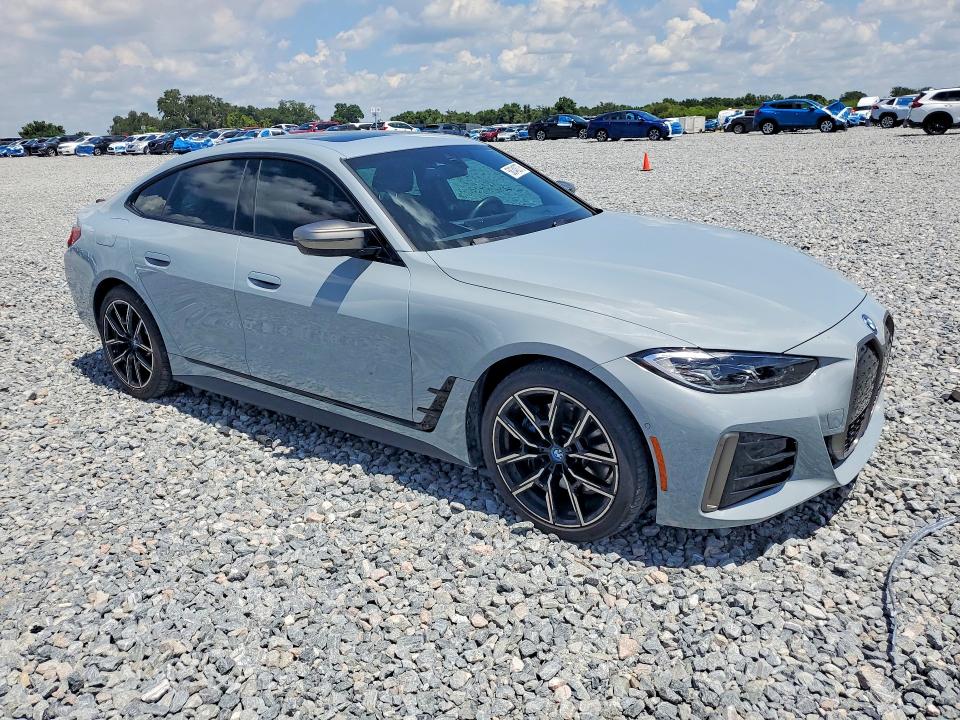 2024 BMW I4 VIN WBY33AW01RFS33055 COPART salvage auction — REAR END, Fl - Certificate Of Destruction, sold $24,300 on 2026-07-31 (photo 4)