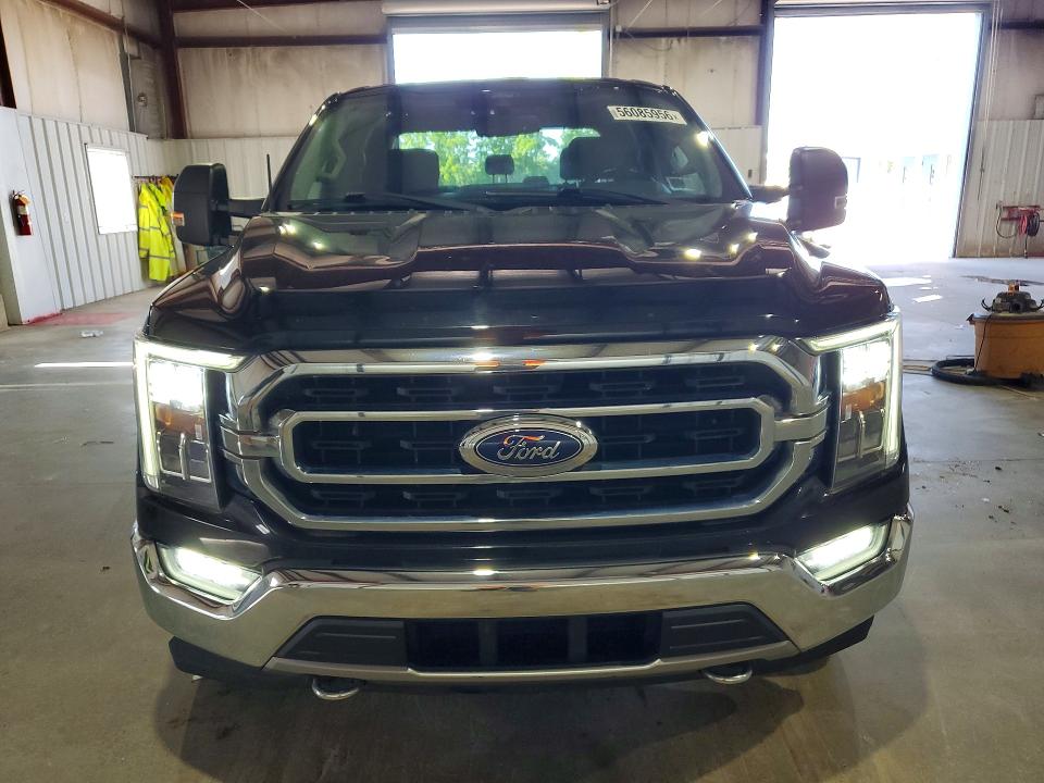 2021 Ford F-150 lightning VIN 1FTFW1ED0MFC14998 COPART salvage auction — REAR END, Ny - Mv-907A Salvage Certificate, sold $16,900 on 2026-07-28 (photo 5)