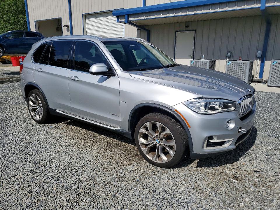 2014 BMW VIN 5UXKR2C58E0H33262 COPART salvage auction — MECHANICAL, SC - DEALER ONLY CLEAN TITLE, sold $975 on 2026-07-02 (photo 4)
