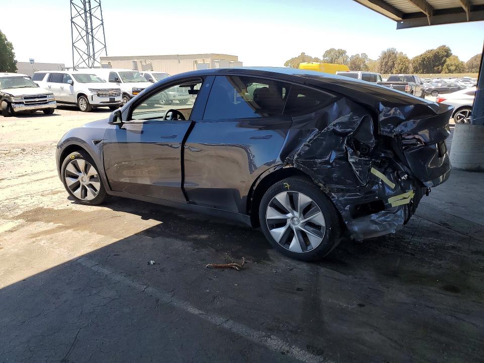 2023 Tesla Model y VIN 7SAYGDEE2PF625377 COPART salvage auction — REAR END, Ca - Salvage Certificate, sold $7,700 on 2026-07-07 (photo 2)