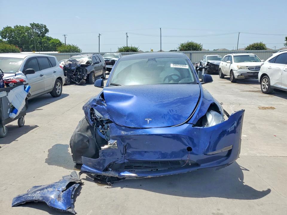 2023 Tesla Model y VIN 7SAYGDEF2PF749870 COPART salvage auction — FRONT END, TX - SALVAGE VEHICLE TITLE, sold $9,500 on 2026-07-20 (photo 5)