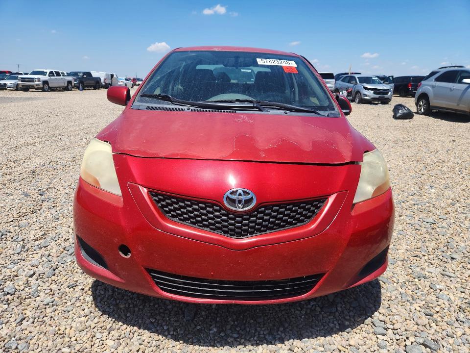 2011 Toyota Yaris VIN JTDBT4K30B1404802 COPART salvage auction — SIDE, Ks - Cert Of Title-Salvage, sold $750 on 2026-07-28 (photo 5)