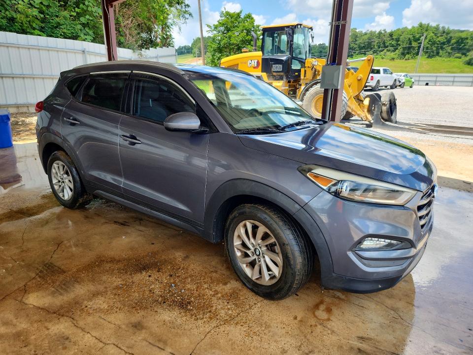 2016 Hyundai Tucson VIN KM8J33A42GU076252 COPART salvage auction — MINOR DENT/SCRATCHES, Tx - Certificate Of Title, sold $1,900 on 2026-07-21 (photo 4)