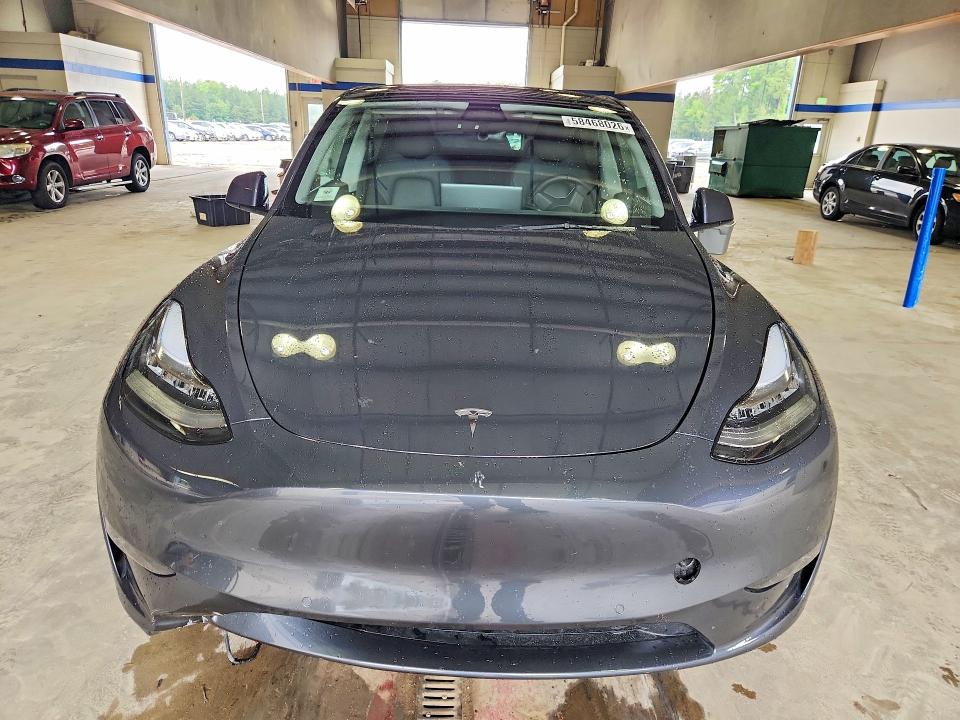 2022 Tesla Model y VIN 7SAYGDEE9NA005510 COPART salvage auction — NORMAL WEAR, Va - Cert Of Title - Salvage, sold $2,550 on 2026-07-24 (photo 5)