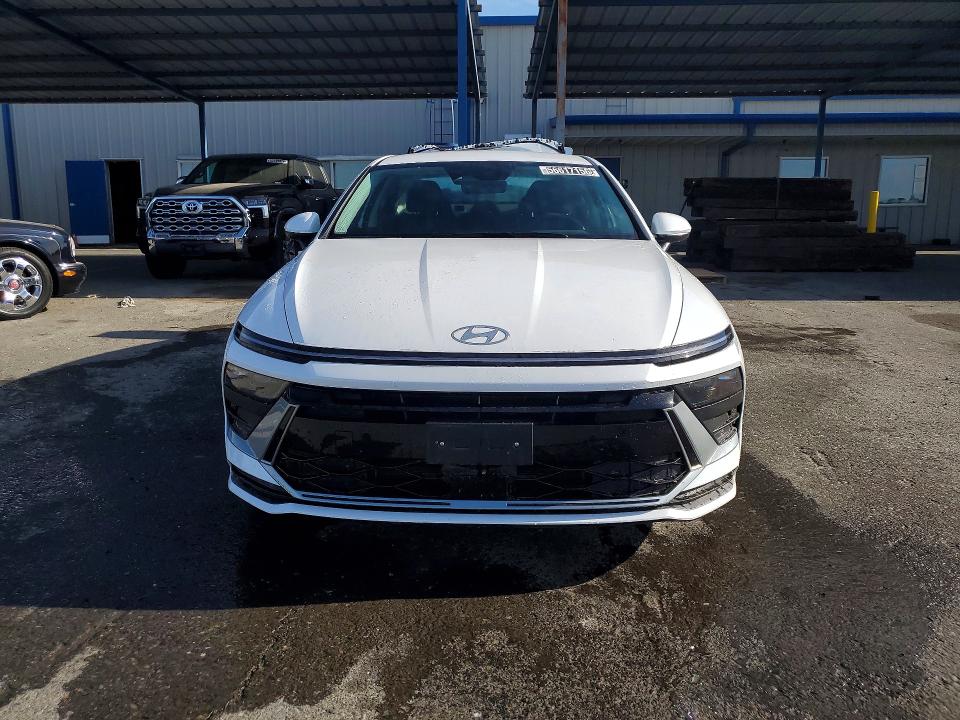 2026 Hyundai Sonata hybrid VIN KMHL24JJ4TA151942 COPART salvage auction — REAR END, CA - NON-REPAIRABLE VEHICLE CERT, sold $8,500 on 2026-07-20 (photo 5)