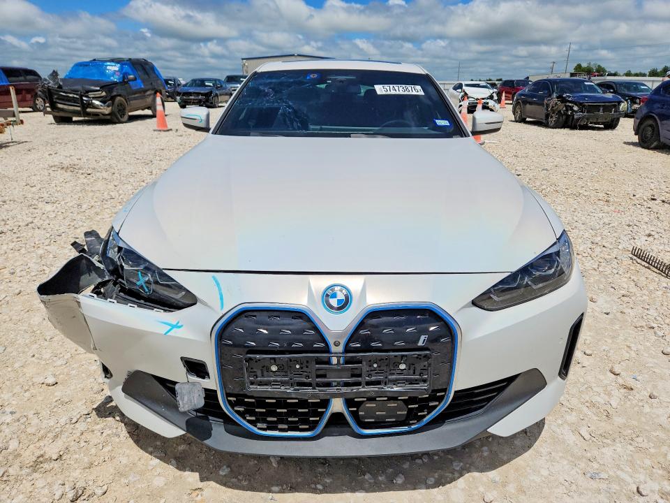 2023 BMW VIN WBY73AW02PFP85873 COPART salvage auction — SIDE, TX - SALVAGE VEHICLE TITLE (P), sold $12,100 on 2026-07-23 (photo 5)