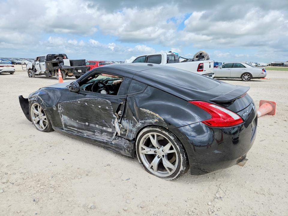 2009 Nissan 370z VIN JN1AZ44E79M405997 COPART salvage auction — SIDE, Tx - Salvage Vehicle Title, sold $2,200 on 2026-07-16 (photo 2)