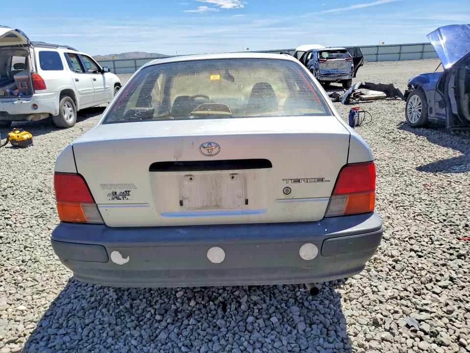 1996 Toyota Tercel VIN JT2AC52L9T0197926 COPART salvage auction — FRONT END, Nv - Salvage Title, sold $90 on 2026-07-30 (photo 6)