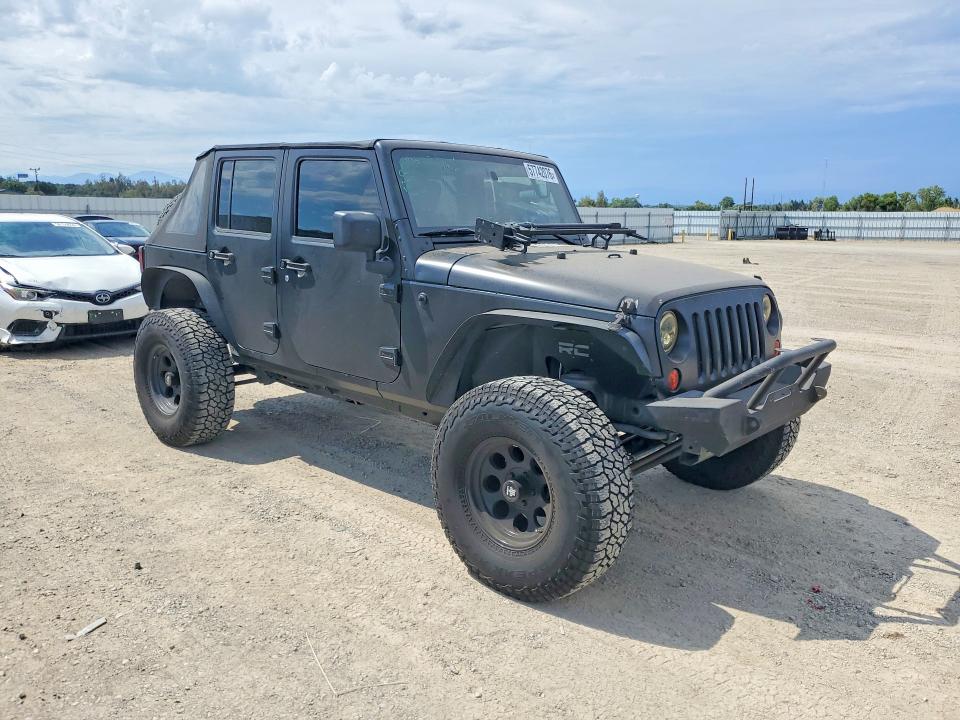 2009 Jeep Wrangler unlimited VIN 1J4GA39129L752913 COPART salvage auction — SIDE, CA - SALVAGE CERTIFICATE, sold $6,600 on 2026-07-02 (photo 4)