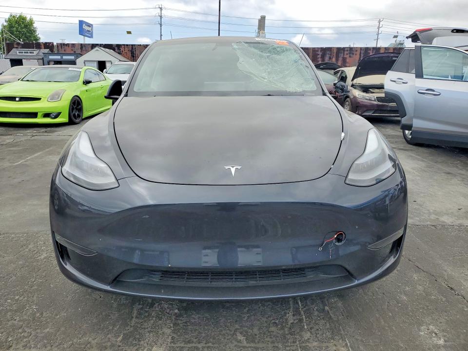 2024 Tesla Model y VIN 7SAYGDED1RF008207 COPART salvage auction — SIDE, Ca - Dis/Dlr/Exp Only Clean Title (P), sold $10,700 on 2026-07-29 (photo 5)