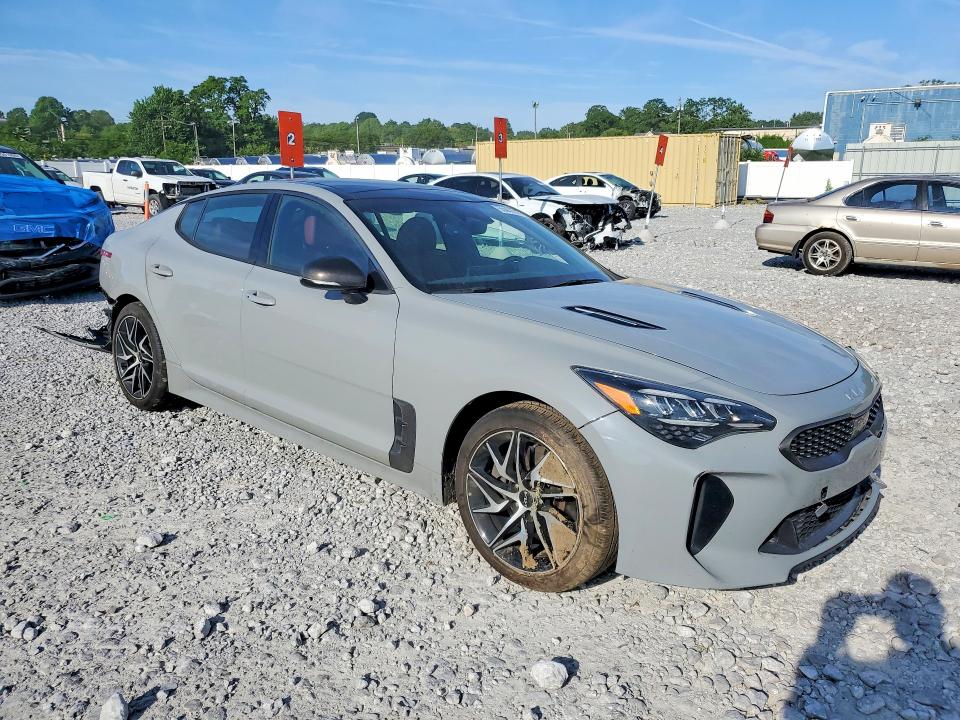 2023 Kia Stinger VIN KNAE35LD1P6135811 COPART salvage auction — SIDE, Oh - Cert Of Title-Salvage, sold $5,800 on 2026-07-10 (photo 4)