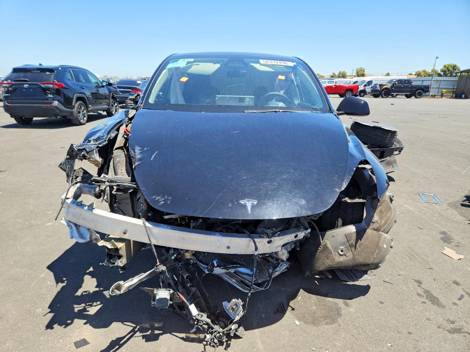 2024 Tesla Model y VIN 7SAYGDED4RF202522 COPART salvage auction — FRONT END, Ca - Salvage Certificate, sold $2,200 on 2026-07-08 (photo 5)