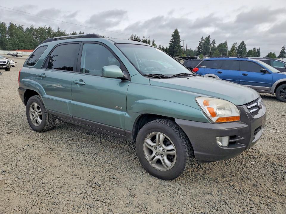 2006 Kia Sportage VIN KNDJE723767249482 COPART salvage auction — MECHANICAL, WA - VEHICLE CERT OF OWNERSHIP-TITL, sold $475 on 2026-07-24 (photo 4)
