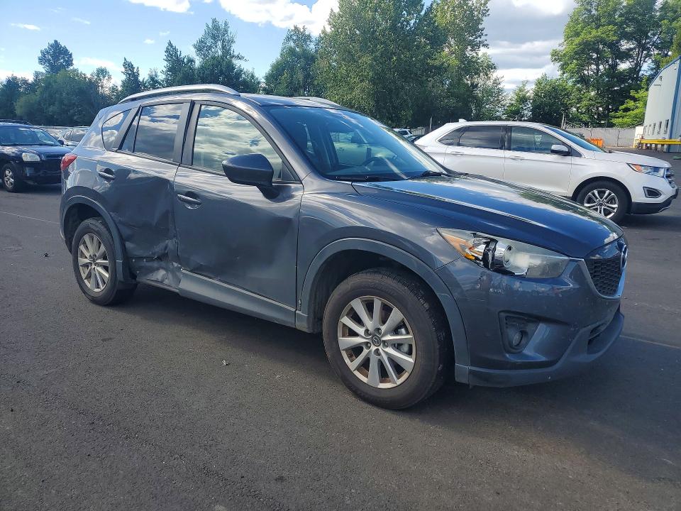 2015 Mazda Cx-5 VIN JM3KE4CY9F0453312 COPART salvage auction — REAR END, OR - CERT OF TITLE-RECONSTRUCTED (P), sold $1,850 on 2026-07-06 (photo 4)