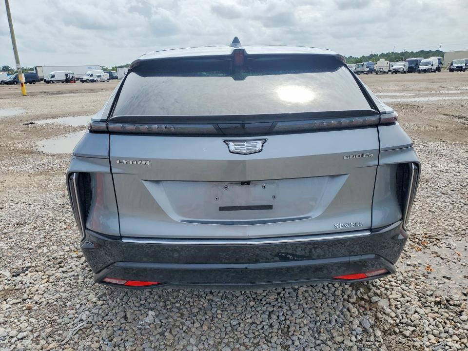 2025 Cadillac VIN 1GYKPNRL7SZ306216 COPART salvage auction — SIDE, Tx - Salvage Vehicle Title, sold $14,400 on 2026-08-10 (photo 6)