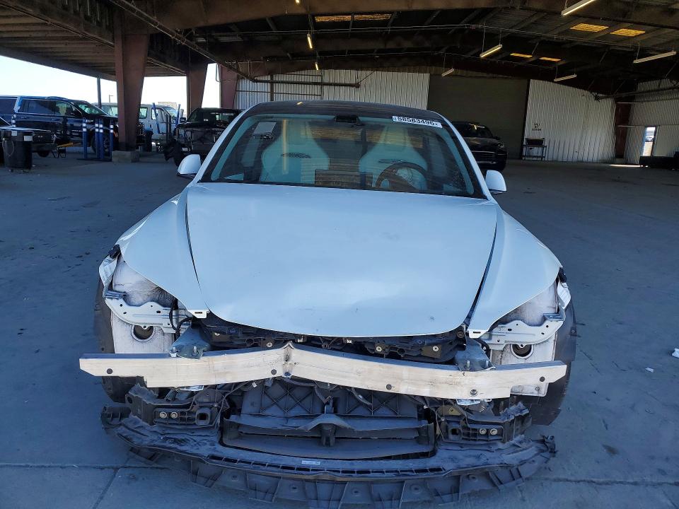 2025 Tesla Model 3 VIN 5YJ3E1ET0SF079973 COPART salvage auction — FRONT END, Ca - Salvage Certificate, sold $400 on 2026-07-09 (photo 5)
