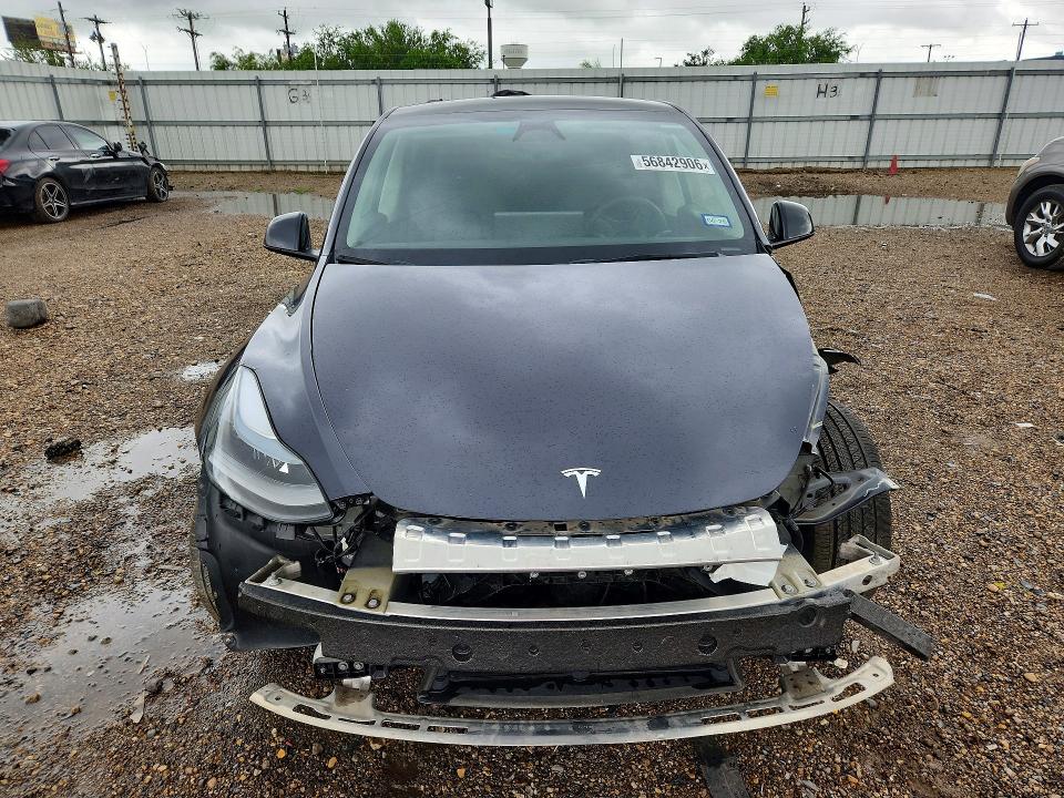 2024 Tesla Model y VIN 7SAYGDED1RF099690 COPART salvage auction — FRONT END, Tx - Salvage Vehicle Title, sold $12,700 on 2026-07-08 (photo 5)