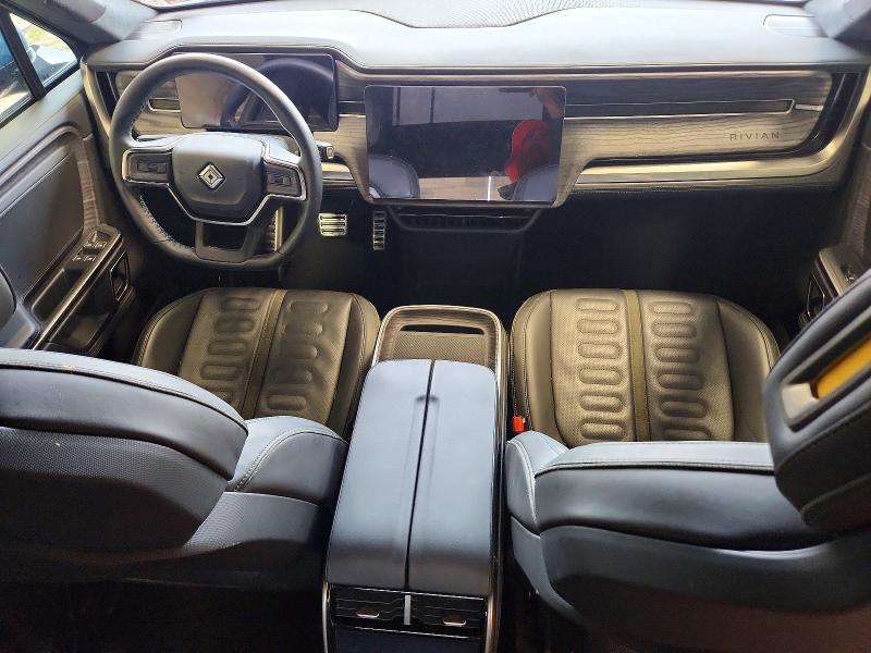 2023 Rivian VIN 7FCTGAAAXPN026117 COPART salvage auction — SIDE, Nc - Salvage Certificate Of Title, sold $8,000 on 2026-07-27 (photo 8)