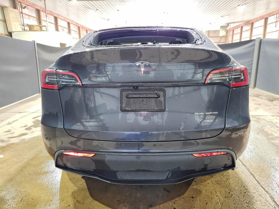 2025 Tesla Model y VIN 7SAYGDEE7SF289184 COPART salvage auction — HAIL, Oh - Certificate Of Title, sold $18,000 on 2026-07-09 (photo 6)