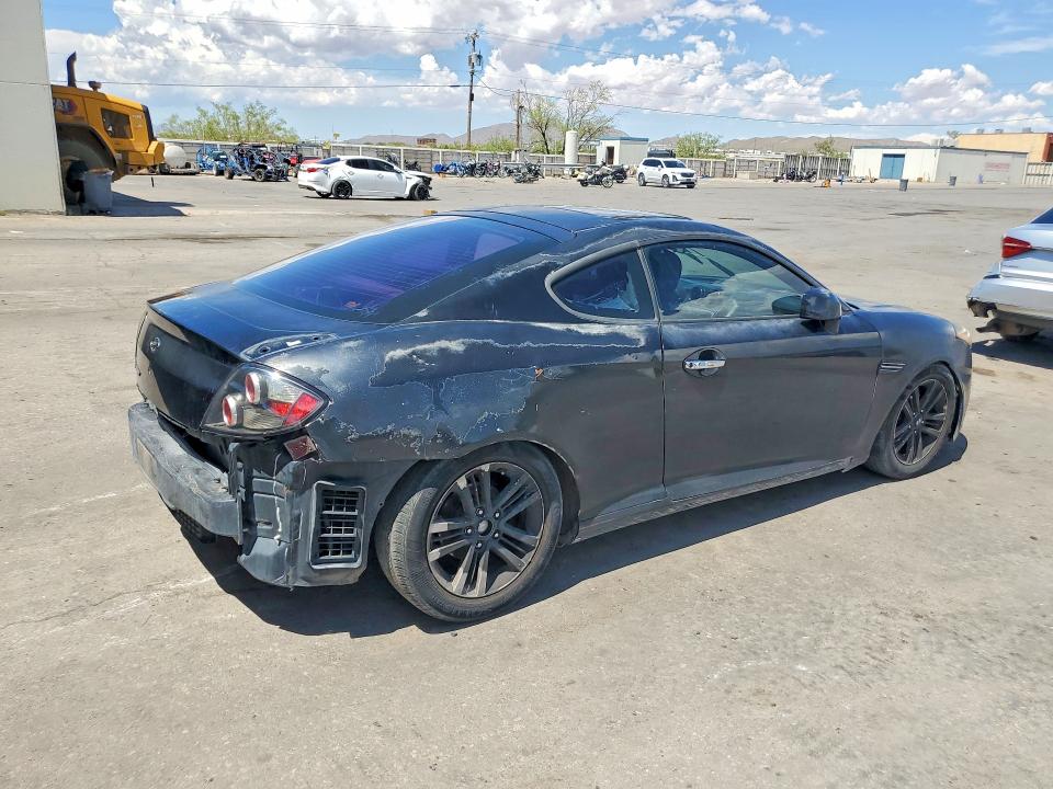 2007 Hyundai Tiburon VIN KMHHM66D17U243934 COPART salvage auction — FRONT END, Tx - Salvage Vehicle Title, sold $275 on 2026-07-10 (photo 3)