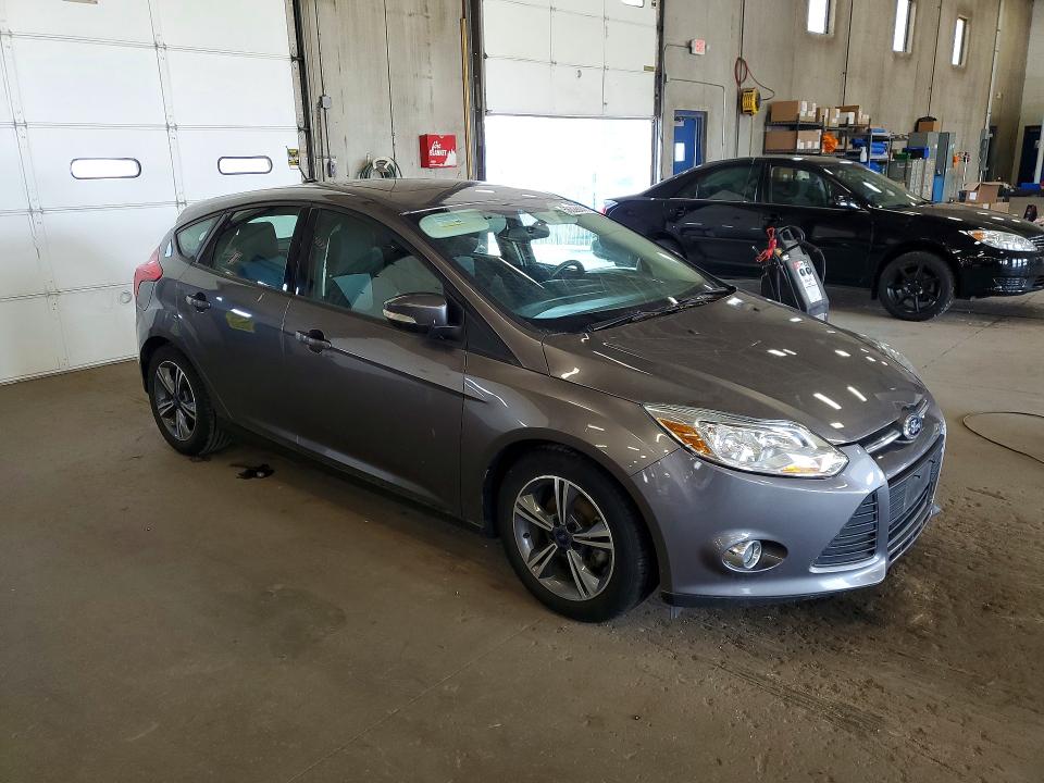 2014 Ford Focus VIN 1FADP3K23EL463579 COPART salvage auction — MECHANICAL, Mn - Certificate Of Title, sold $1,275 on 2026-07-03 (photo 4)