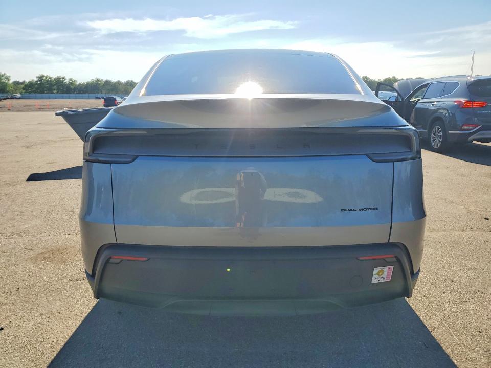 2026 Tesla Model y VIN 7SAYGDEE6TA636518 COPART salvage auction — SIDE, Ny - Mv-907A Salvage Certificate, sold $18,900 on 2026-07-13 (photo 6)