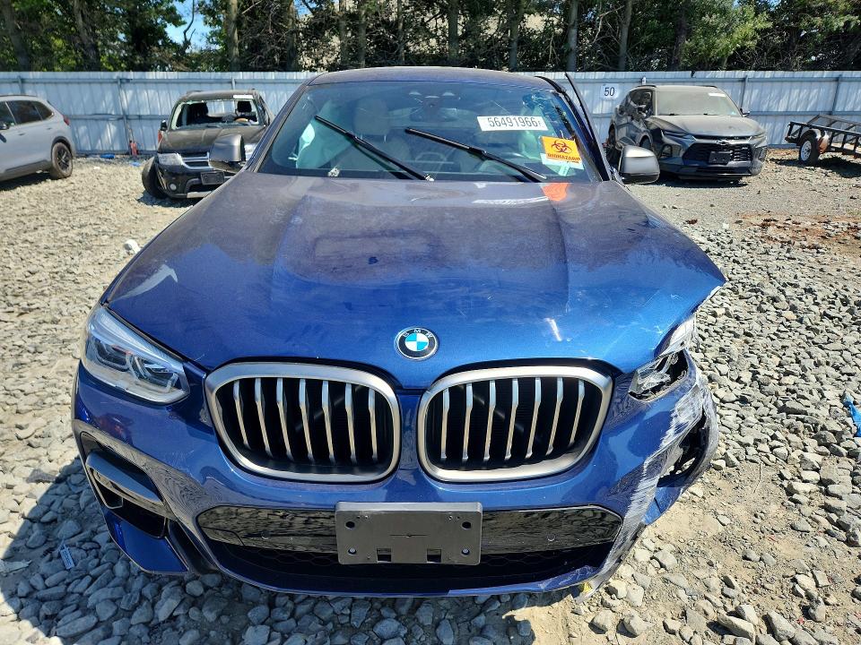 2021 BMW X4 VIN 5UX2V5C03M9E50831 COPART salvage auction — FRONT END, Ny - Mv-907A Salvage Certificate, sold $9,300 on 2026-07-22 (photo 5)