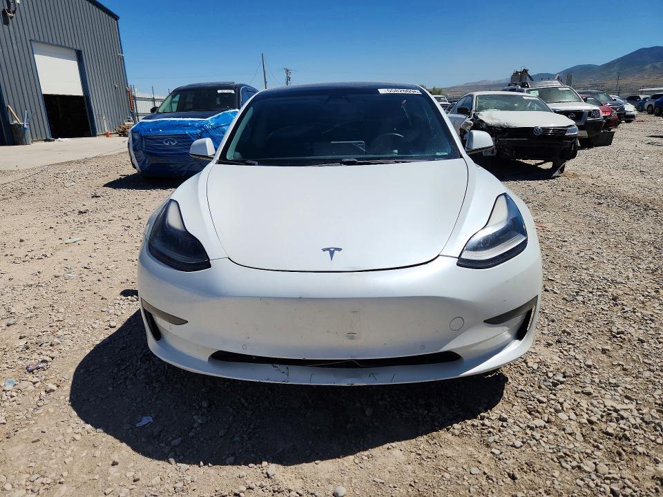 2021 Tesla Model 3 VIN 5YJ3E1EB8MF928242 COPART salvage auction — SIDE, UT - SALVAGE CERTIFICATE, sold $7,600 on 2026-07-31 (photo 5)