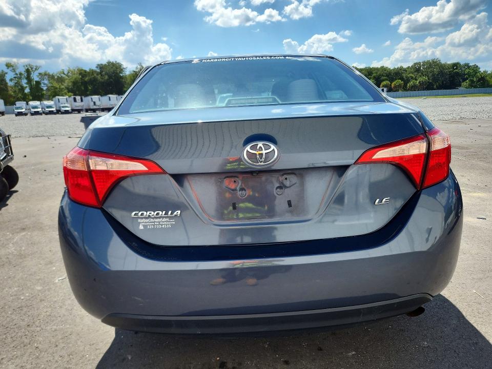 2018 Toyota VIN 5YFBURHE9JP826693 COPART salvage auction — SIDE, Fl - Cert Of Title Slvg Rebuildable, sold $4,050 on 2026-07-06 (photo 6)