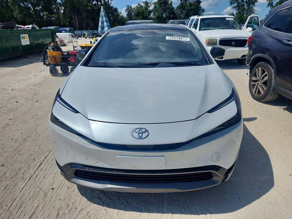 2023 Toyota Prius VIN JTDACAAU5P3011474 COPART salvage auction — MINOR DENT/SCRATCHES, LA - CERTIFICATE OF TITLE, sold $18,300 on 2026-07-23 (photo 5)
