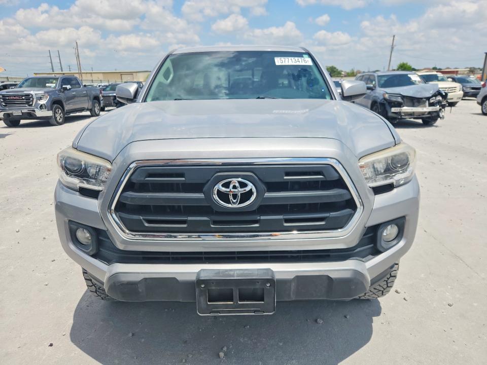 2017 Toyota Tacoma VIN 5TFAZ5CN4HX037702 COPART salvage auction — SIDE, TX - SALVAGE VEHICLE TITLE, sold $10,600 on 2026-07-28 (photo 5)