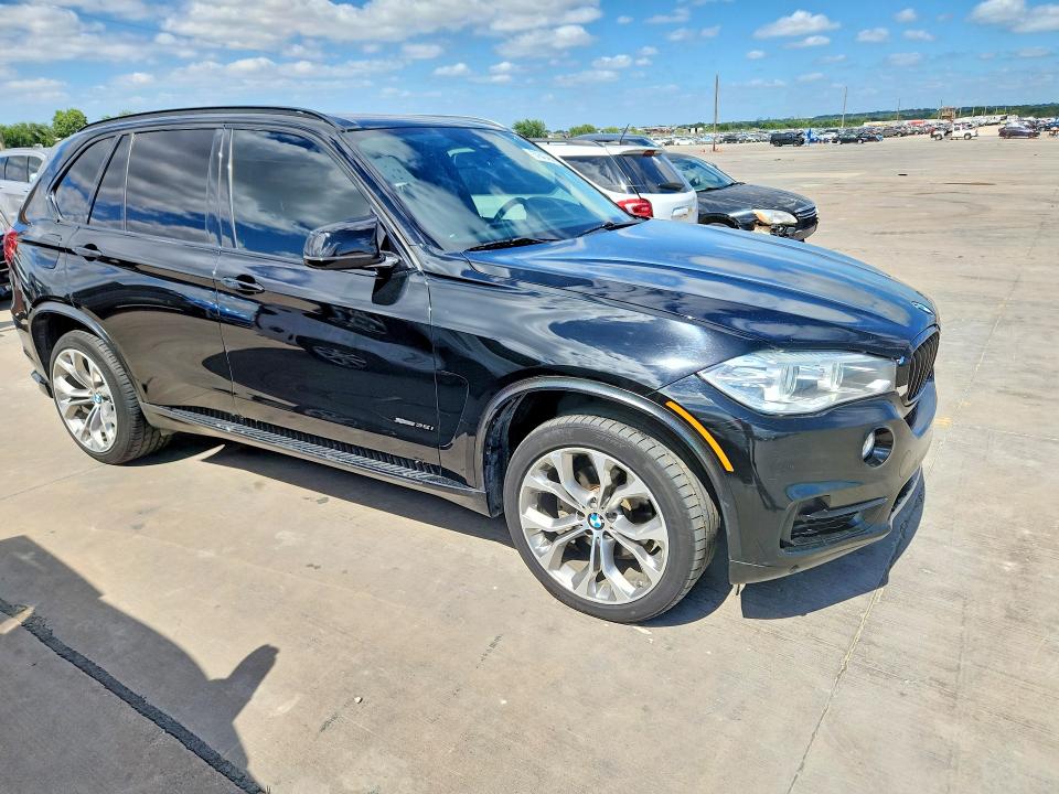 2015 BMW VIN 5UXKR0C58F0P11460 COPART salvage auction — NORMAL WEAR, Tx - Certificate Of Title, sold $4,250 on 2026-07-09 (photo 4)