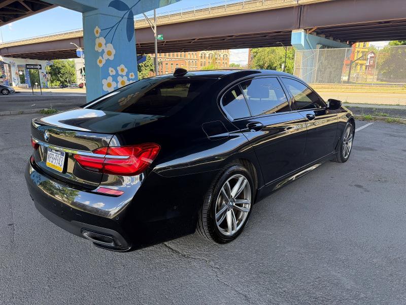 2019 BMW 7 series VIN WBA7F2C56K8240643 COPART salvage auction — NORMAL WEAR, Pa - Reconstructed Clean (P), sold $19,700 on 2026-07-27 (photo 4)