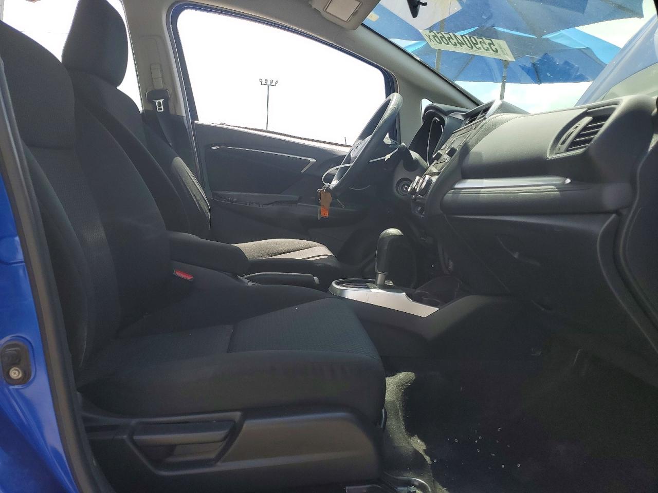 2019 Honda Fit VIN 3HGGK5H4XKM700090 COPART salvage auction — Side, TX - SALVAGE VEHICLE TITLE, sold $2,250 on 2026-07-09 (photo 7)