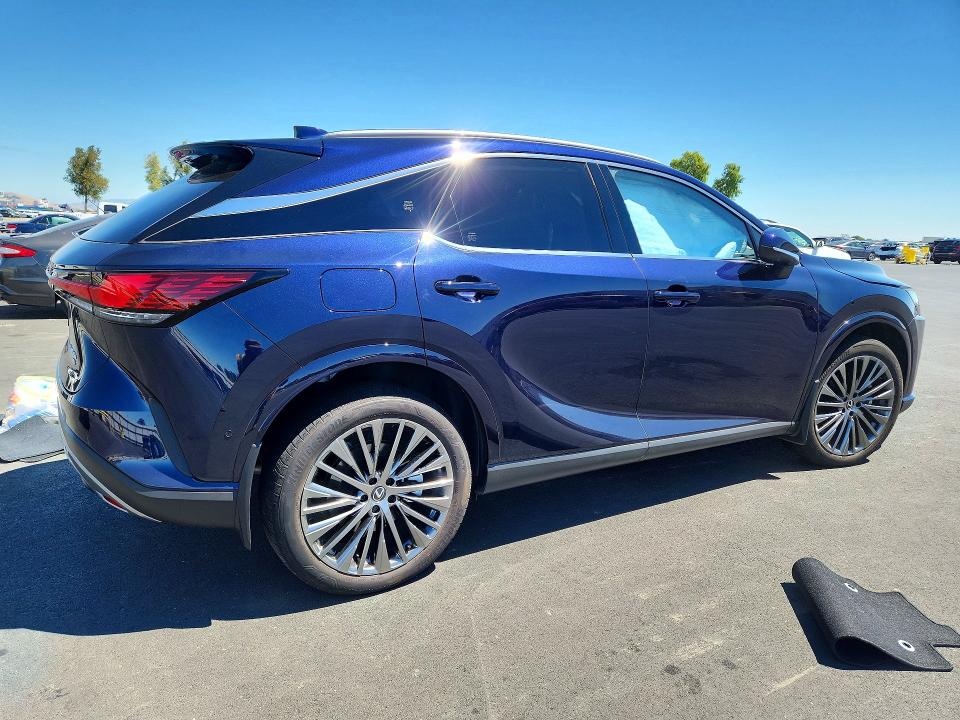 2025 Lexus Rx VIN JTJCJMGA6S2028308 COPART salvage auction — SIDE, Id - Salvage Certificate Of Title, sold $36,500 on 2026-09-02 (photo 3)